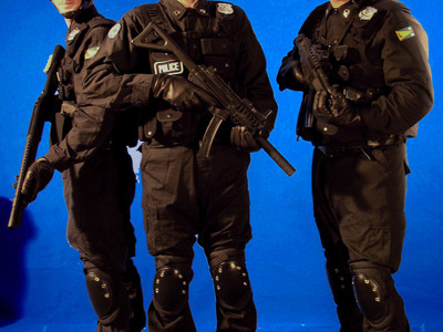 These tactical police costumes with helmets, weapons, and accessories are part of our costume rental library. 	