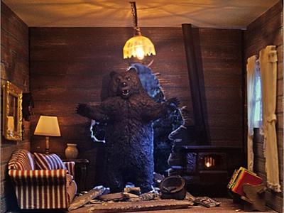 This is a 1/12 scale miniature bear ravaging a log cabin that we created with the TV lighting effect for Farmers Insurance for their Hall of Claims ad campaigns.	