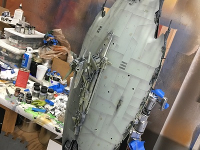 This 1/500 Scale miniature shooting model of an Enemy Battleship spacecraft is getting painted and electrical installed for JAX.	